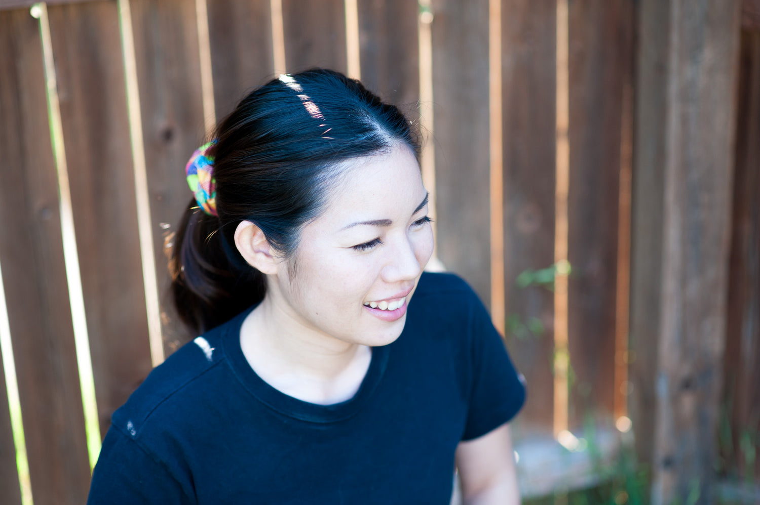 Rie, the founder of KIKI Japan, is wearing a scrunchie from KIKI Japan. 