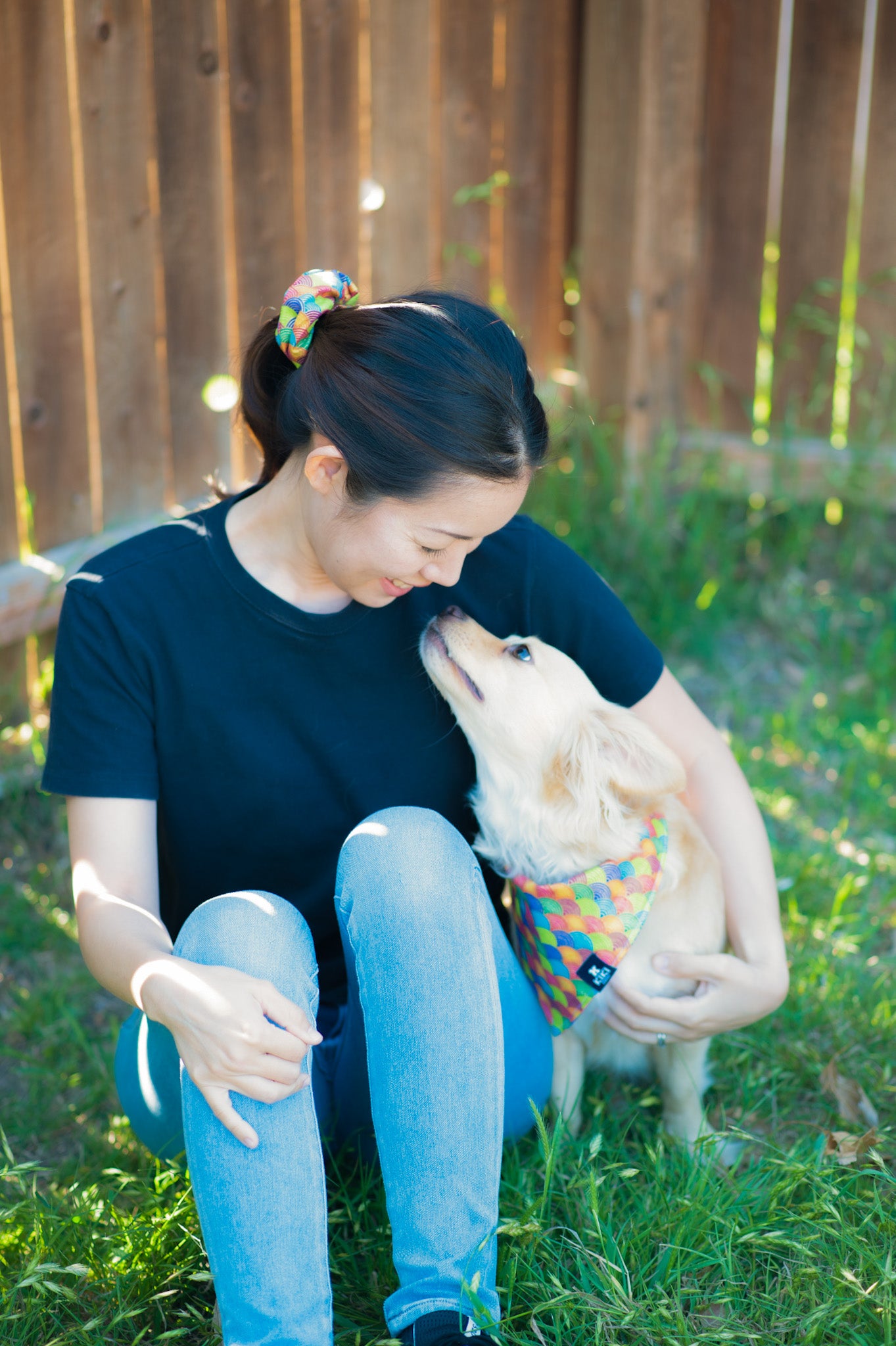 Rie, the founder of KIKI Japan, sitting with her dog, Kiki.